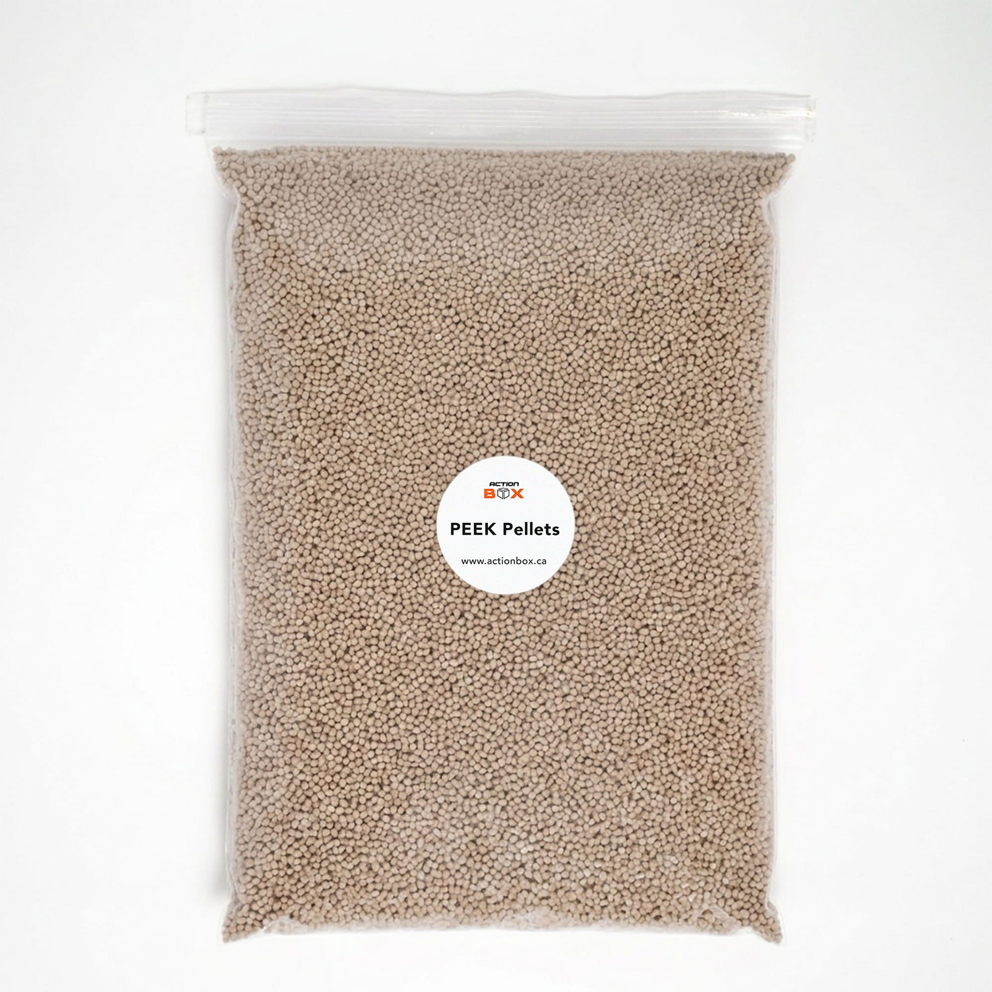 Bag of PEEK plastic pellets for use with injection molders for injection molding. Sold by Action BOX. Extreme heat resistant and rigid.