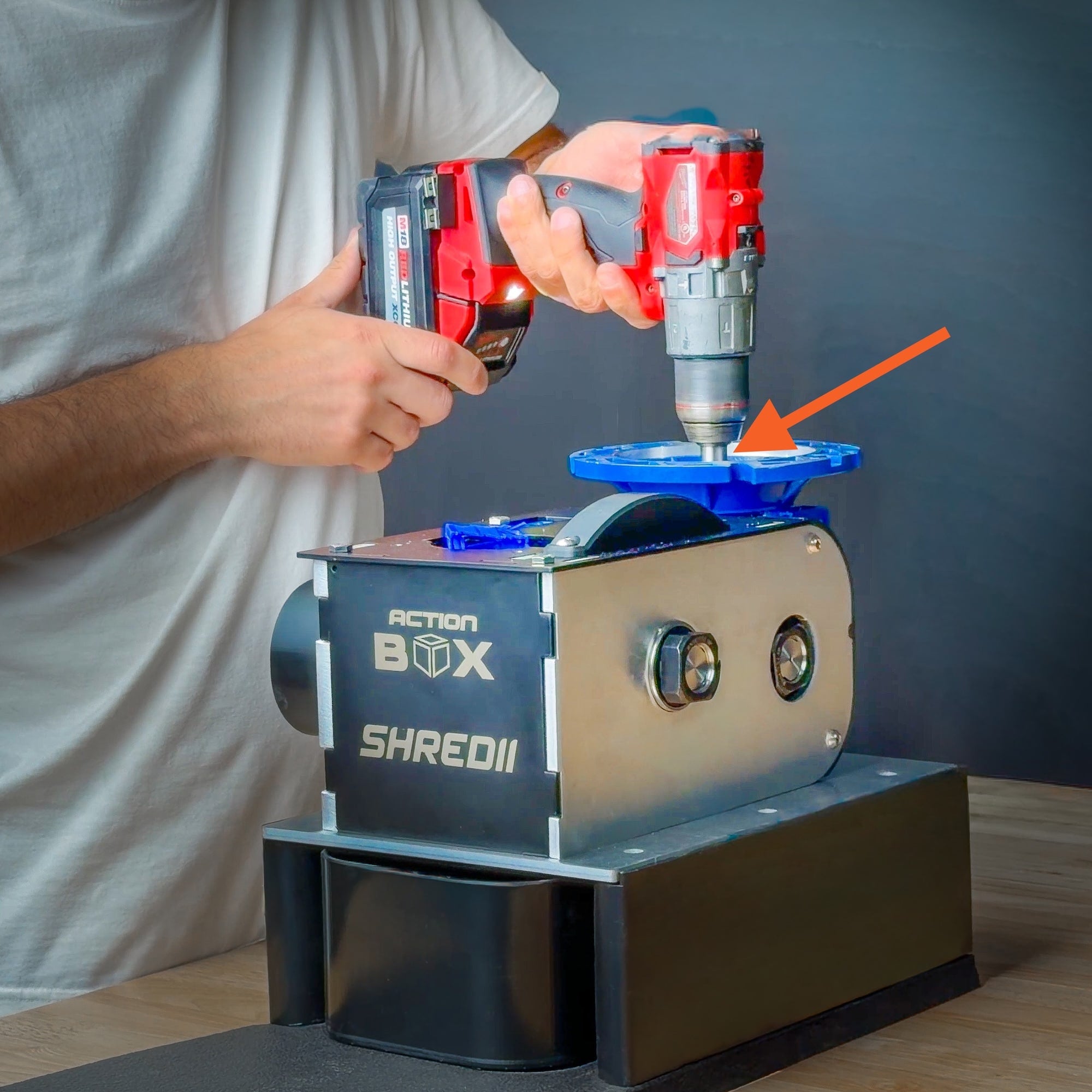 Using a drill to power SHREDII 8 with an adapter that allows you to use a drill instead of a motor on this desktop shredder.