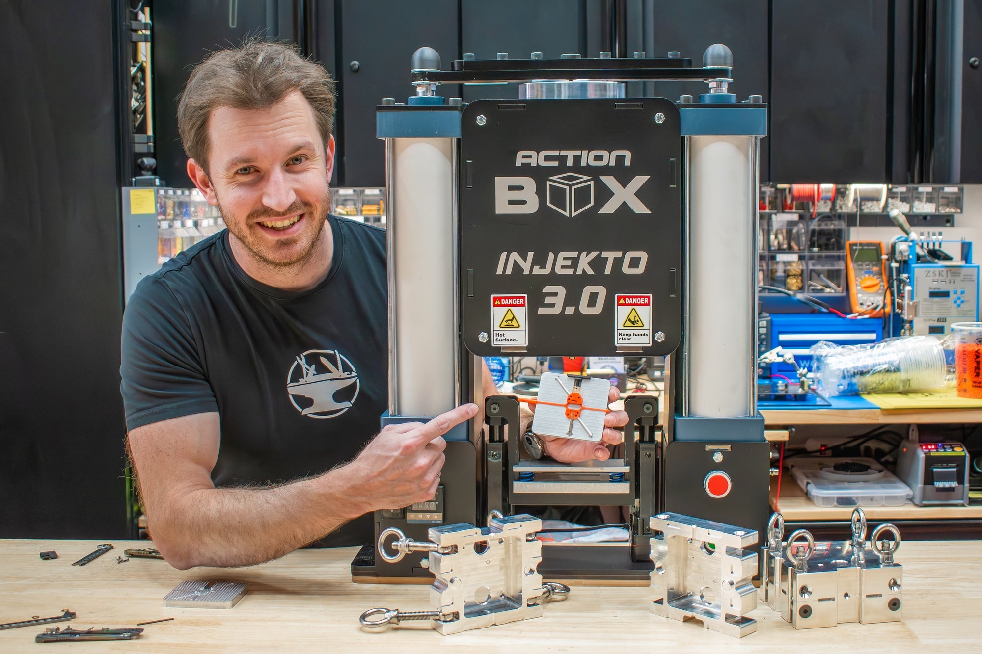 The Hacksmith (James Hobson) beside INJEKTO 3 by Action BOX. Created his first plastic injection mold.
