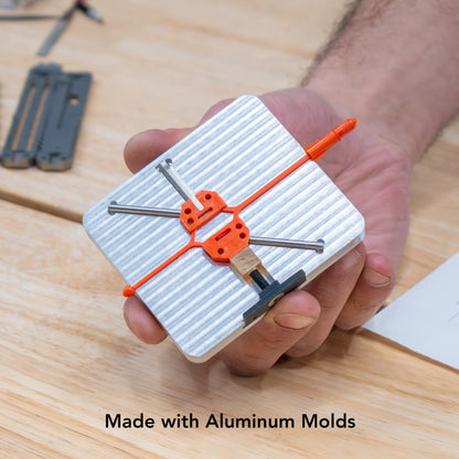 Aluminum metal plastic injection molded part made with Action BOX easy flow PP pellets using INJEKTO 3 desktop injection molder.