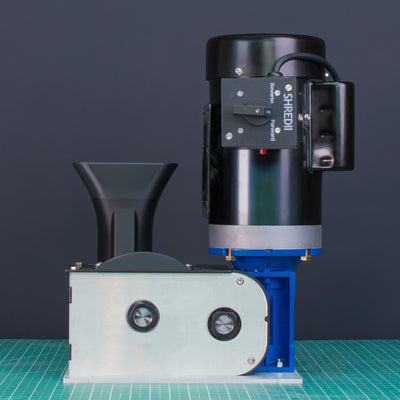 SHREDII 8 Mechanical Kit by Action BOX. Mini industrial shredder used to shred plastic, bottles, metal compatible with a motor. Shredder for tough materials, left side of machine.